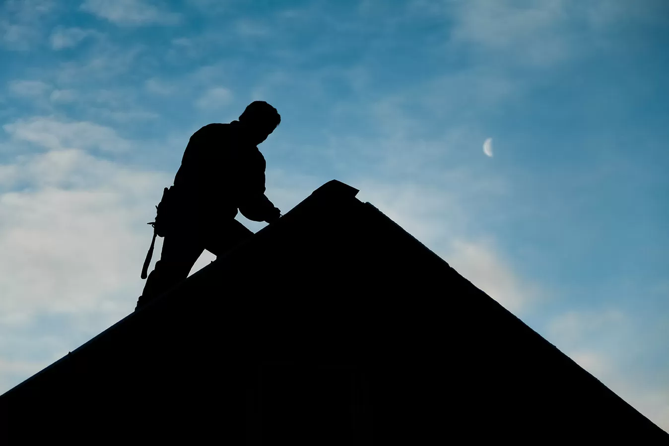Roofers, Roofing Contractor on rooftop in the evening of an El Paso home