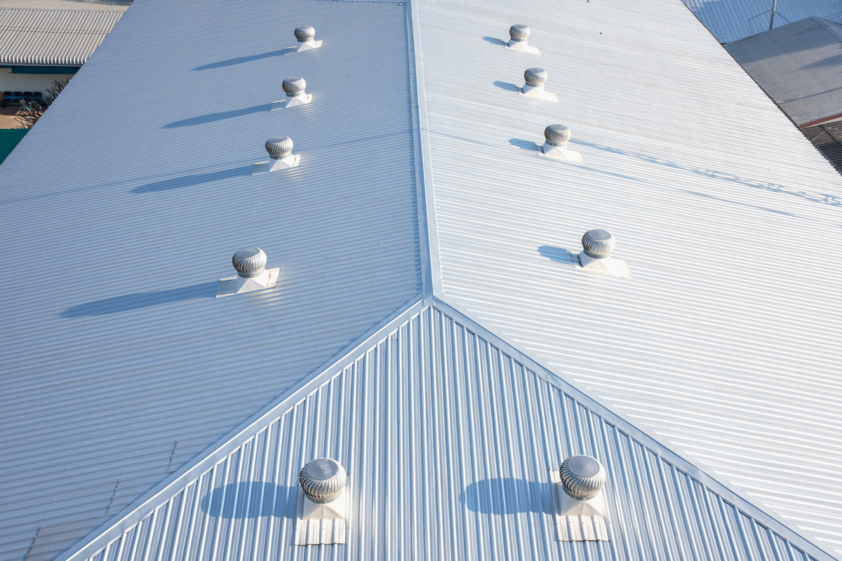 A white, metal commercial roof in El Paso.